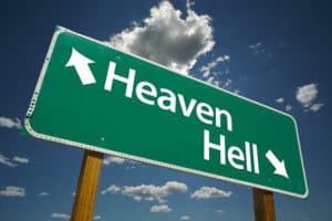 Sign showing the way to heaven and to hell